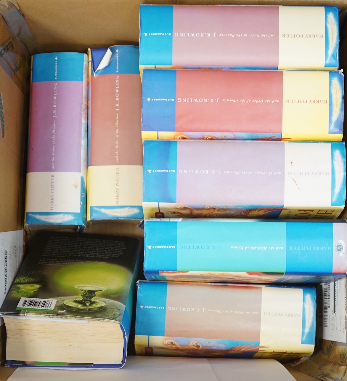 A group of Harry Potter books including some 1st editions